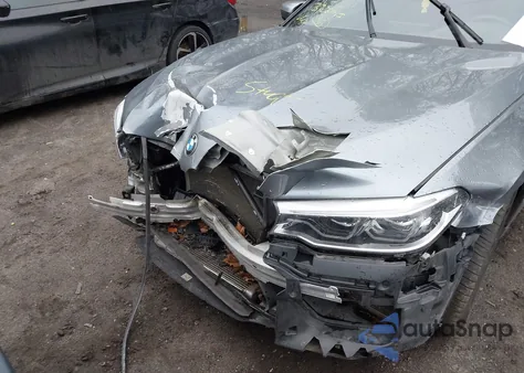 2018 BMW M5 z USA, uszkodzony, nr VIN WBSJF0C51JB282593